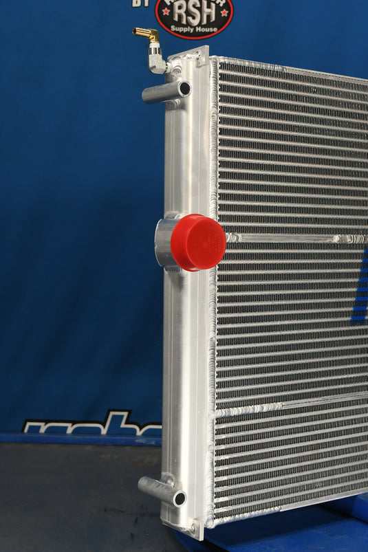 Oshkosh H-Series, XF Broom Radiator